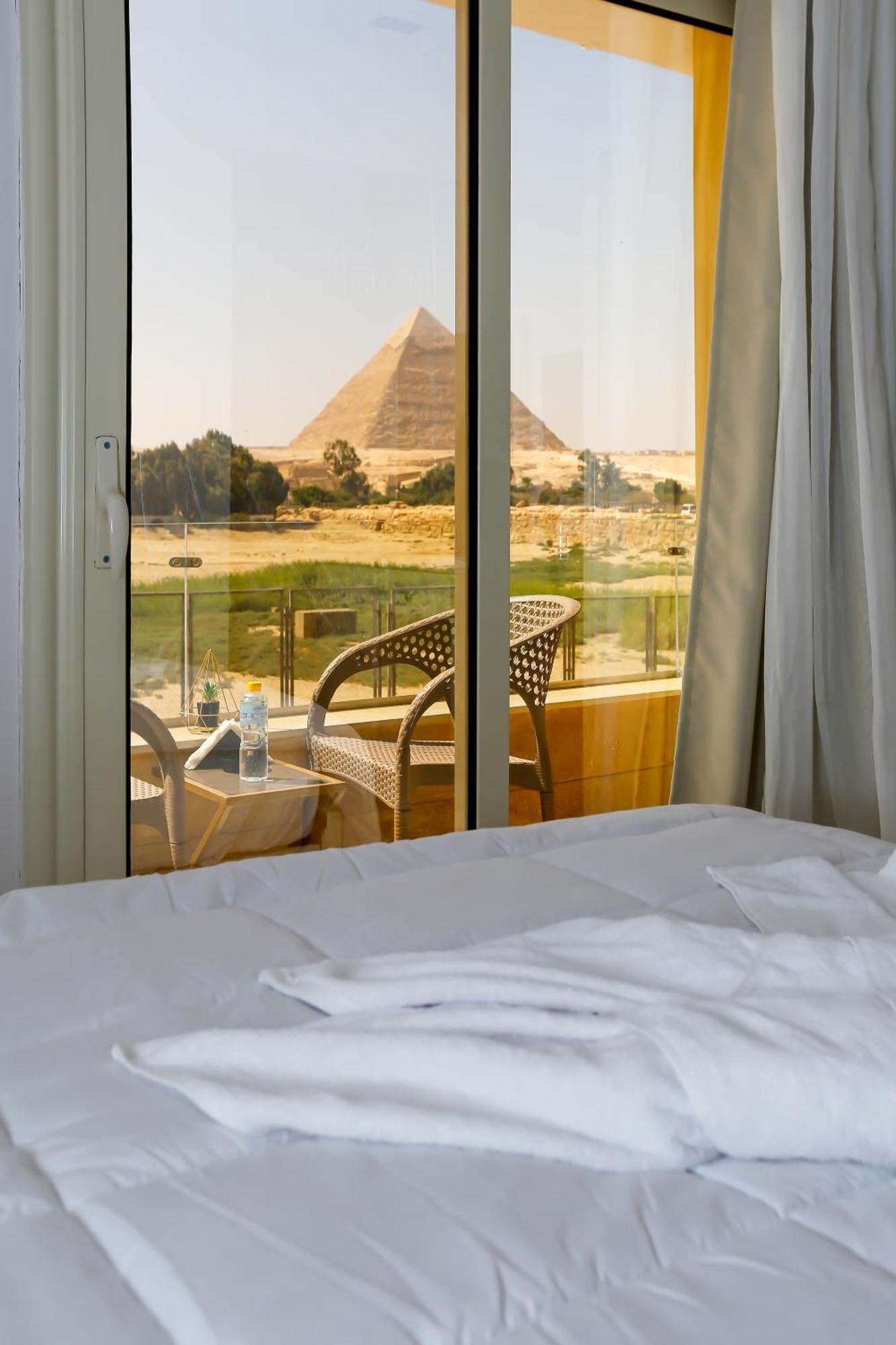 Pyramids Land Palace Kafret el-Gabal Exteriör bild